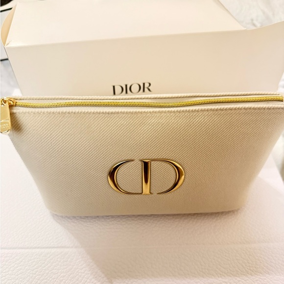 Dior Handbags - Dior Cream Cosmetic Bag with Gold Details